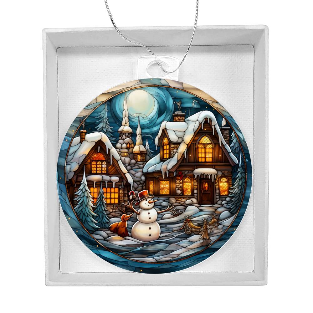 Snowy cottage Christmas acrylic ornament featuring a snowman and moonlit winter scene in gift box. Perfect holiday decoration.