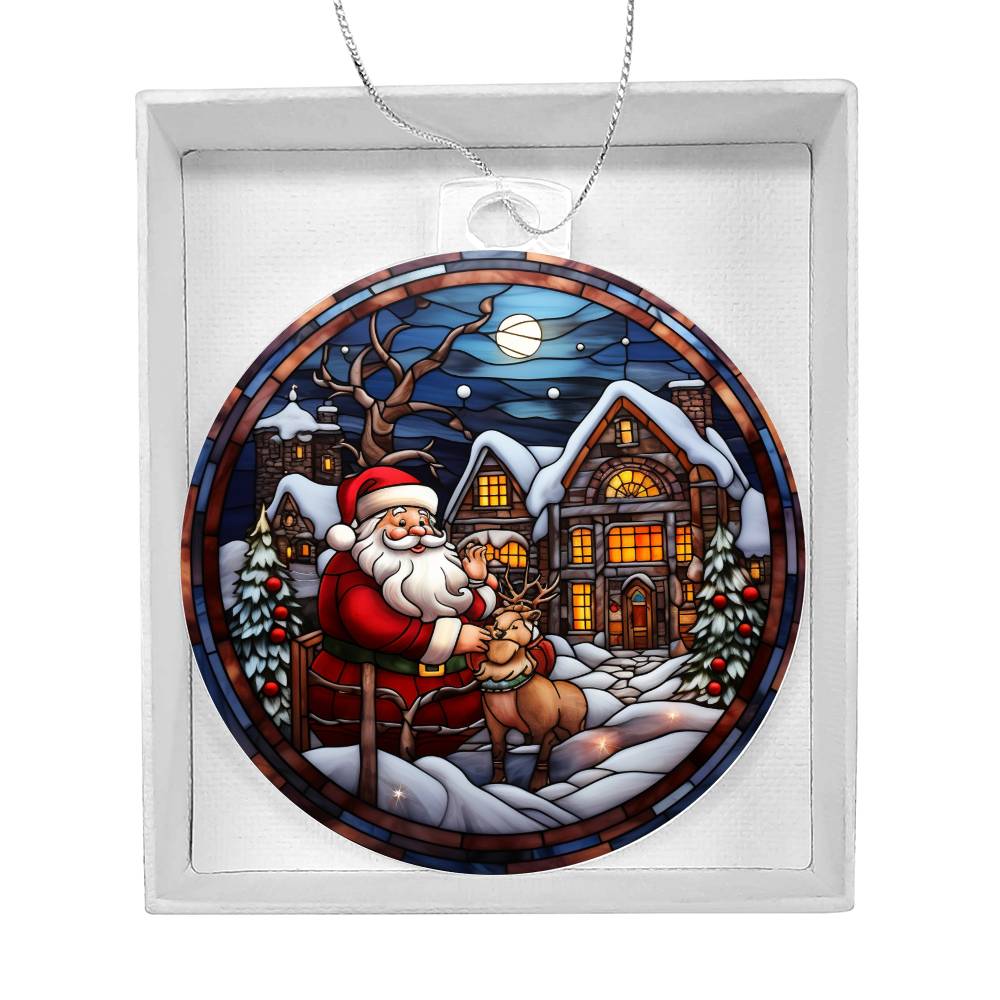 Christmas acrylic ornament with Santa and reindeer in a snow-covered village, featuring glowing lights and moonlit sky.