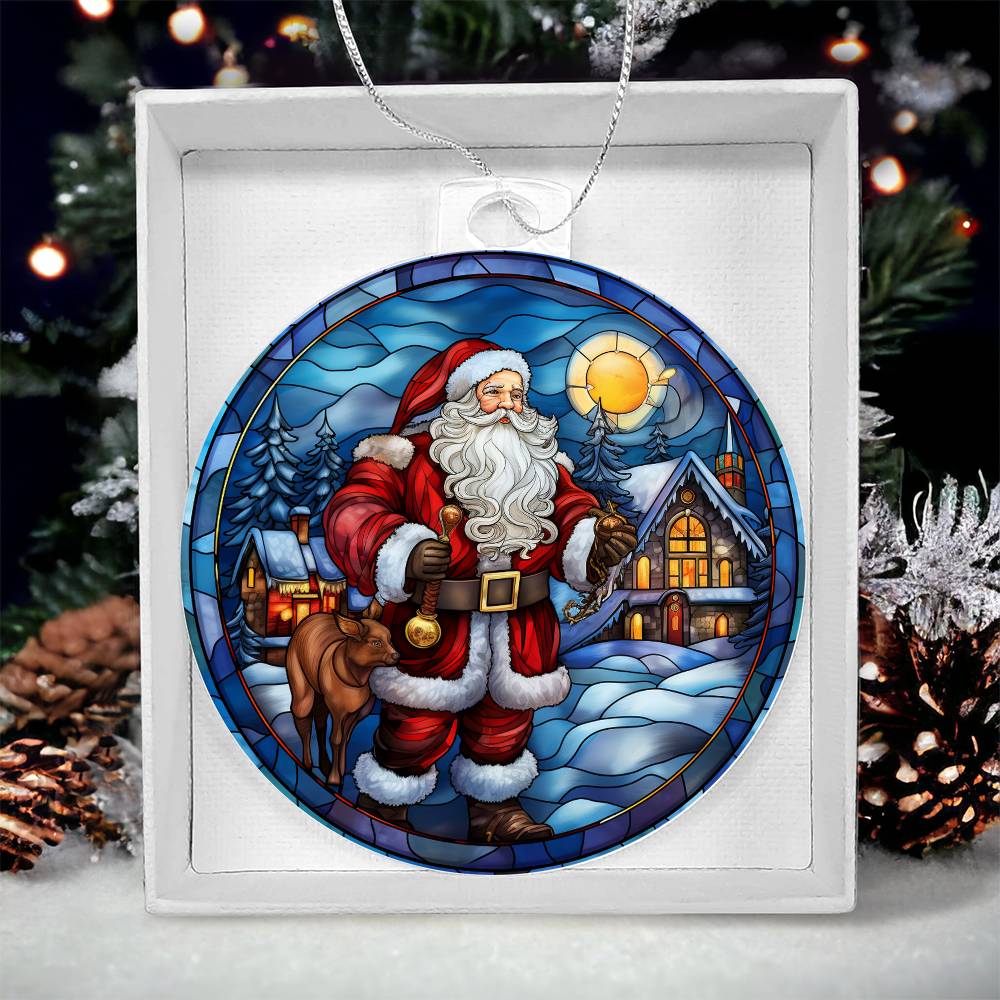 Christmas acrylic ornament with Santa, cozy cabin, snow-covered trees, and sunset glow, perfect for holiday decor.