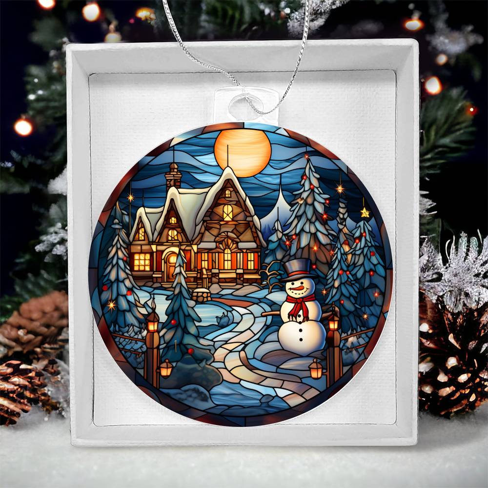 Christmas acrylic ornament with snowy night scene, featuring a snowman, cozy cottage, and twinkling lights under a full moon.