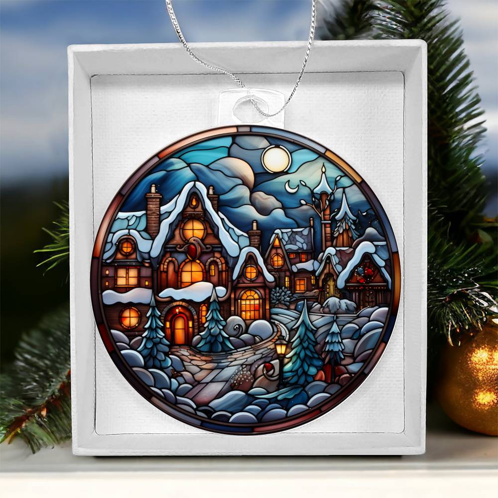 Moonlit Christmas Village Ornament with snowy cottages and glowing lights in a gift box, perfect for holiday decor.