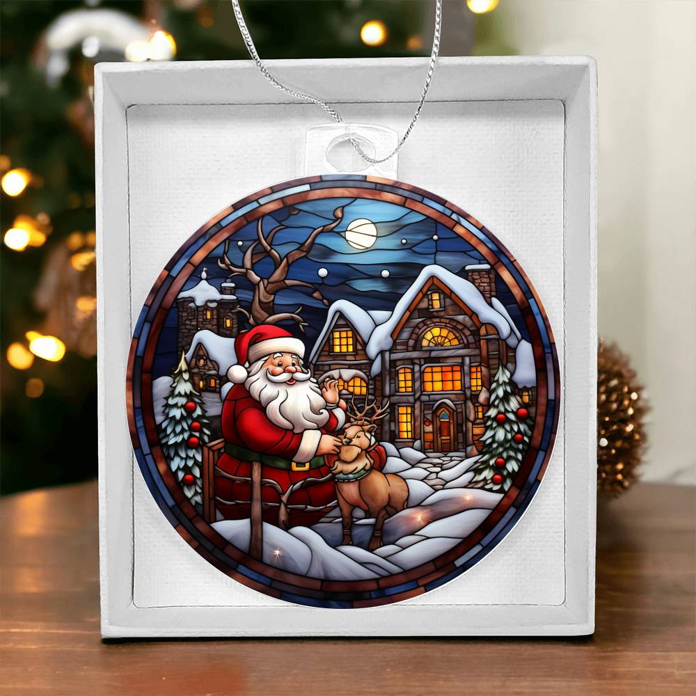 Christmas acrylic ornament with Santa and reindeer in a snow-covered village, moonlit sky, holiday decor in gift box.