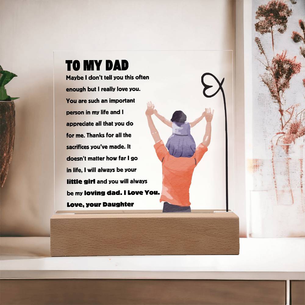 Square acrylic plaque with heartfelt message from daughter to dad on a wooden stand