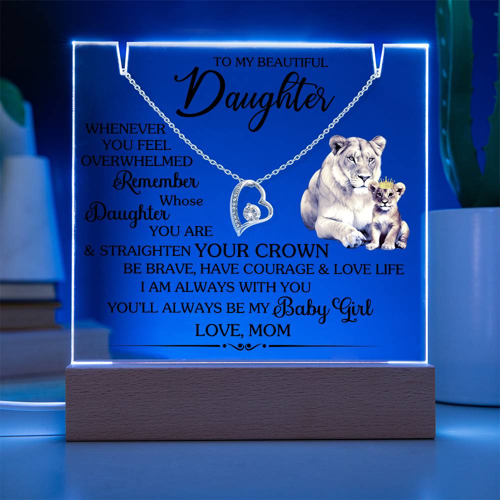 Square acrylic design with Forever Love Necklace for daughter featuring lioness and cub, illuminated in blue light, sentimental gift.