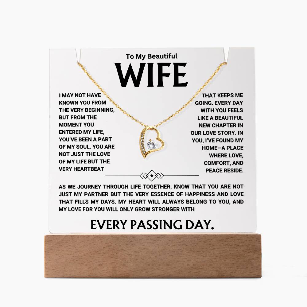 Keepsake acrylic gift for wife with a loving message and heart-shaped pendant on display, perfect for expressing love and commitment.